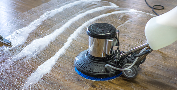 machine cleaning floor with foaming chemicals